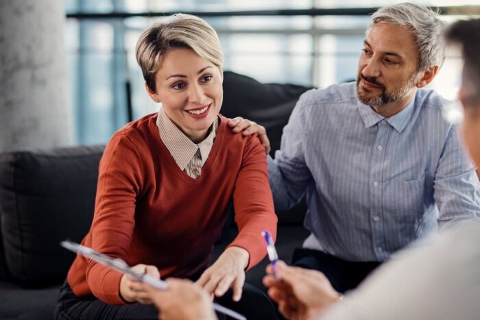 What are the differences between a third pillar 3a and 3b? middle-aged woman getting ready to sign her insurance contract